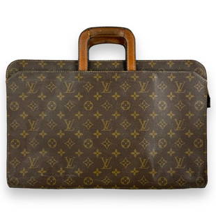 Vintage Louis Vuitton classic brown leather jacquard monogram document briefcase bag with hideaway: Vintage Louis Vuitton classic brown leather jacquard monogram document briefcase bag with hideaway handles. Measures approx. 11" height x 17" width x 2 3/4" depth. Shows wear consistent with age and u