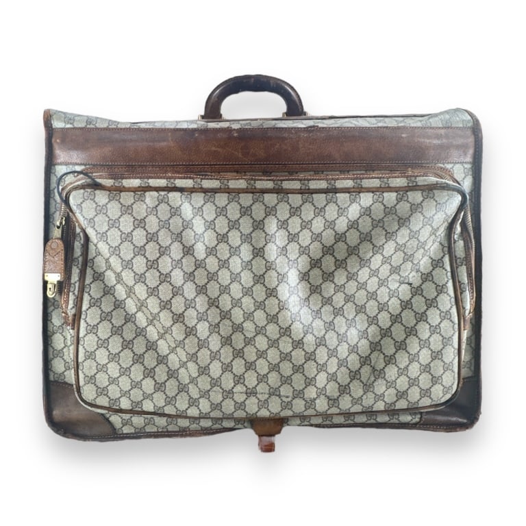 Vintage designer Gucci classic brown leather monogram folding softside suitcase luggate. Measures (1 of 7)