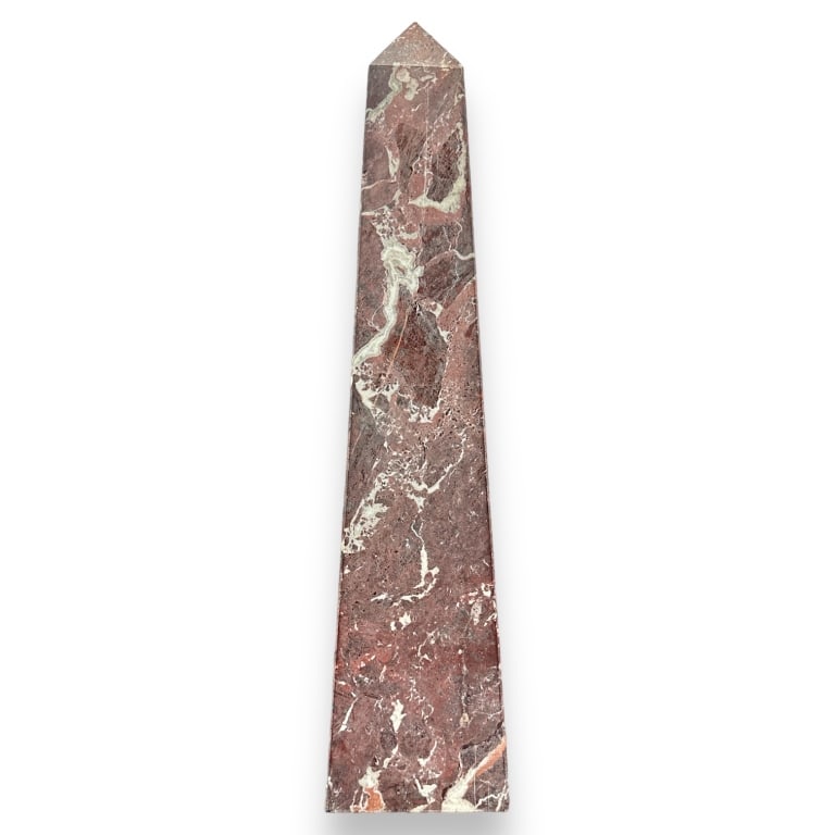 A solid carved and polished rouge marble obelisk phallic sculpture. No apparent hallmarks. Measures (1 of 2)
