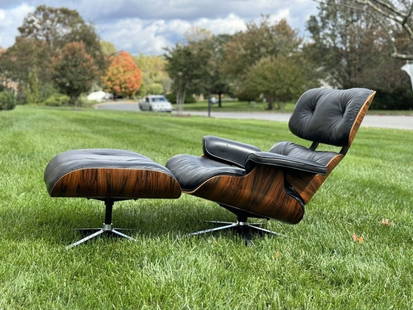 Eames Herman Miller Rosewood Lounge Chair and Ottoman with black leather. The leather has it's: Eames Herman Miller Rosewood Lounge Chair and Ottoman with black leather. The leather has it's typical wear from being over 50 years old. This one has a truly remarkable grain as you can see from the