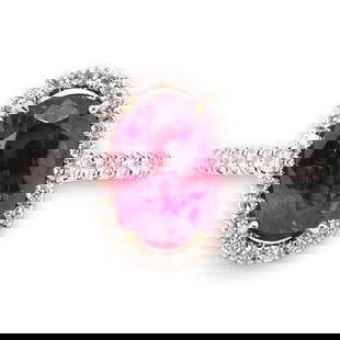 A women's hand made 18k white gold ring featuring a GIA certified ruby gemstone surrounded by a halo: A women's hand made 18k white gold ring featuring a GIA certified ruby gemstone surrounded by a halo of genuine round cut diamonds flowing down the shank and the underside of the ruby setting. Thailan