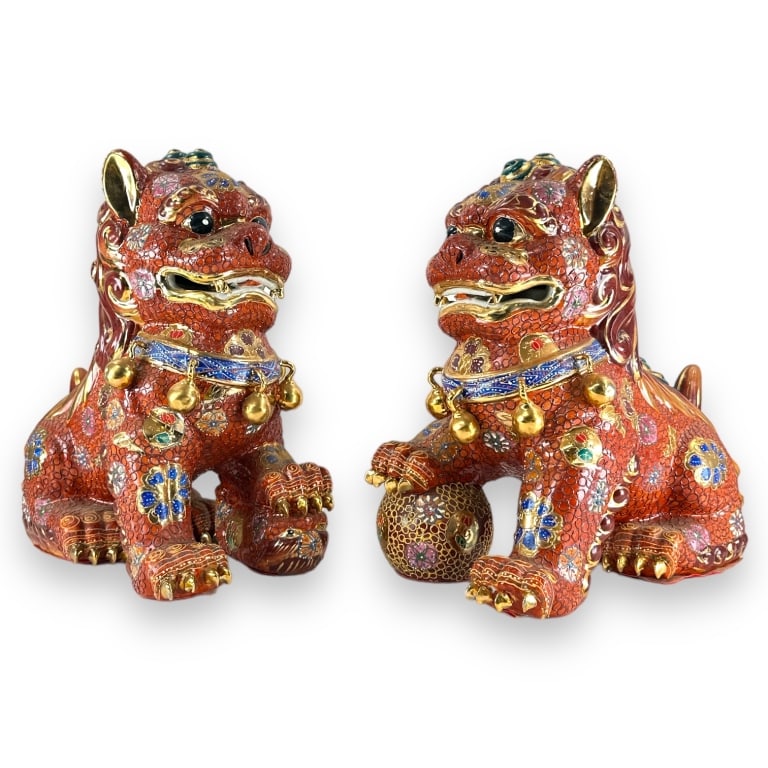 A pair of Contemporary Chinese hand painted enameled porcelain Foo Lion temple sculptures. No: A pair of Contemporary Chinese hand painted enameled porcelain Foo Lion temple sculptures. No apparent marks or obscured. Each measures approx. 16 1/2" height x 8 1/4" width x 15 1/4" depth. Each appe