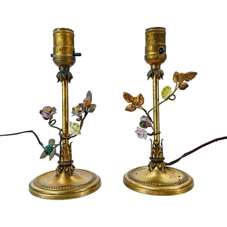 Pair of vintage gilt brass figural floral Rococco style lamps having an enameled flower design. Each: Pair of vintage gilt brass figural floral Rococco style lamps having an enameled flower design. Each marked "MADE IN U.S.A." and numbered 24. Each measures approx. 9 5/8" height x 4 3/4" width x 4 1/2