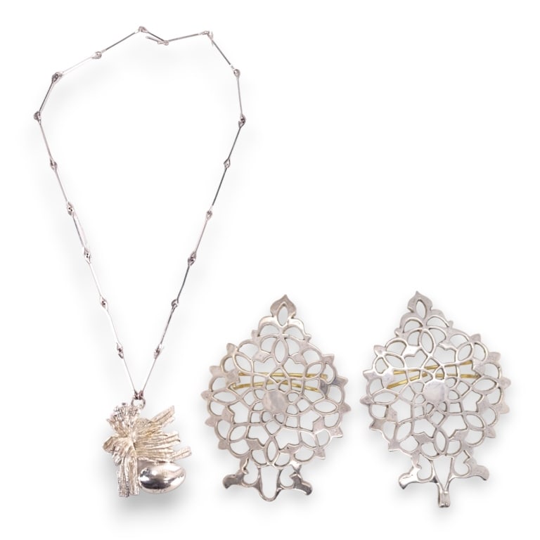 A lot of 2 vintage sterling silver items to include a belt buckle by MMA having a scrolled vine (1 of 5)