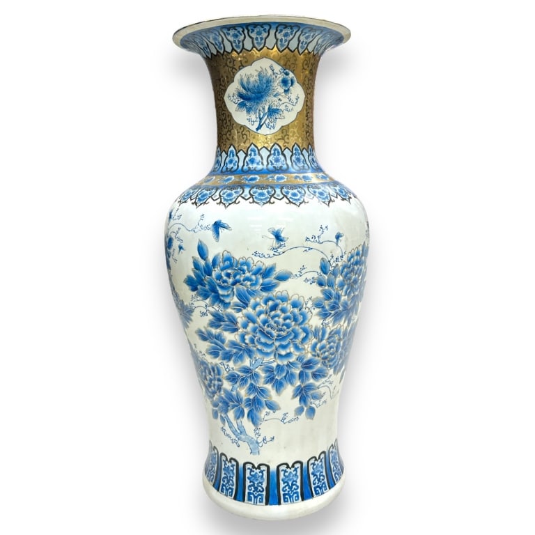 A Chinese blue and white porcelain palace size floor vase having floral designs. No apparent (1 of 4)