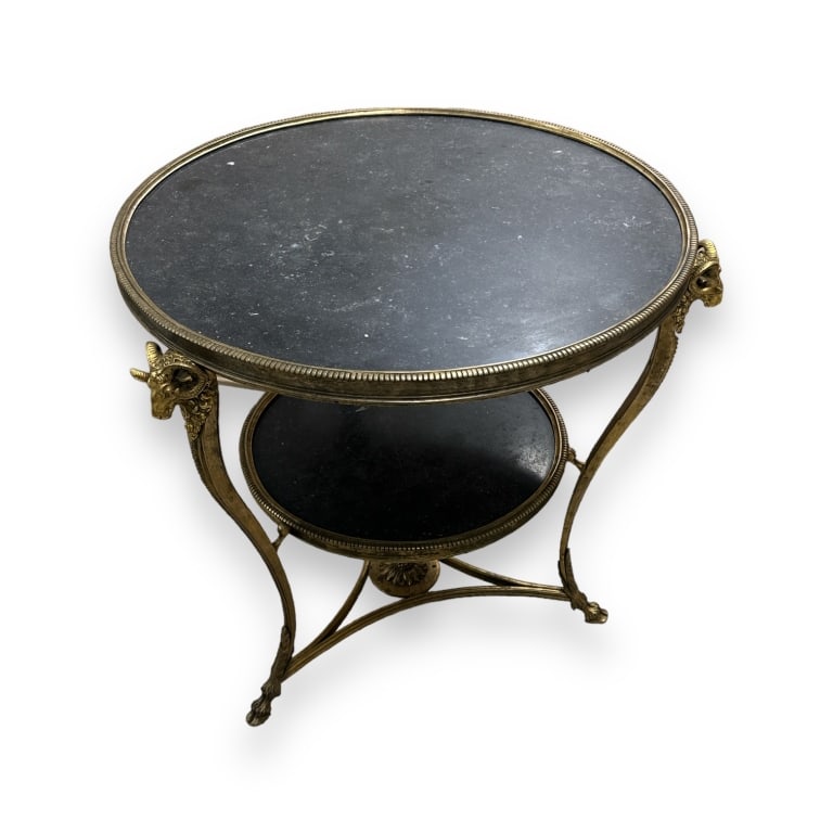 A mid century or earlier round table crafted of gilt bronze frame having a figural ram's head design (1 of 4)