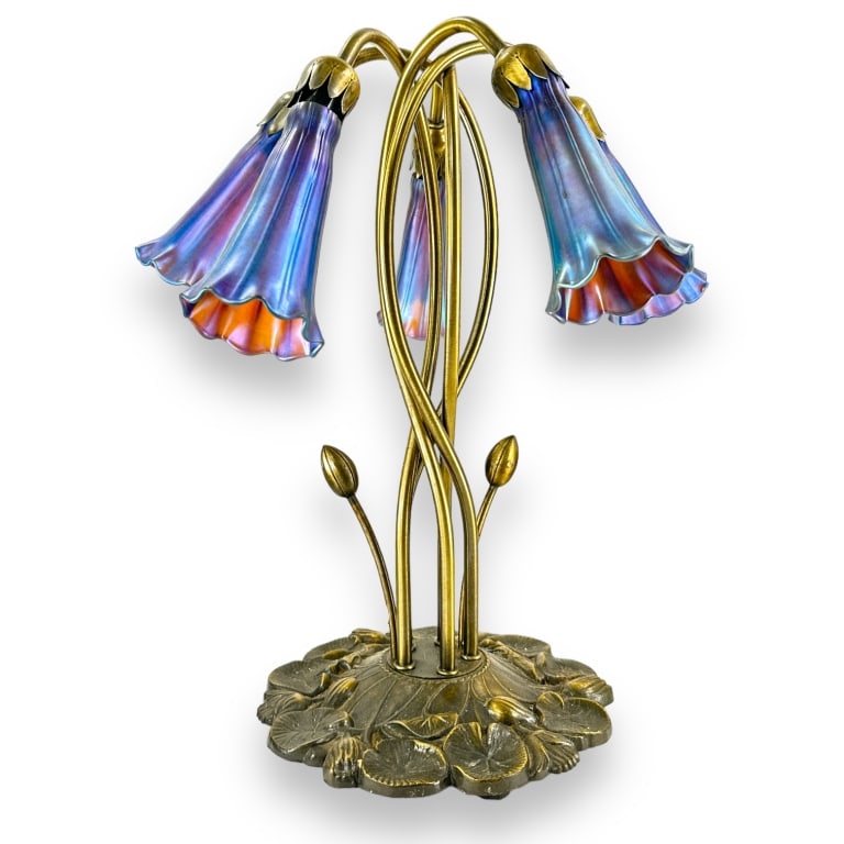Art Nouveau style five cobalt shade lamp. Has a metal base with lily pad design. Measures approx.: Art Nouveau style five cobalt shade lamp. Has a metal base with lily pad design. Measures approx. 17" height x 15" diameter. Appears in overall good condition. JD/B15/SH:15A