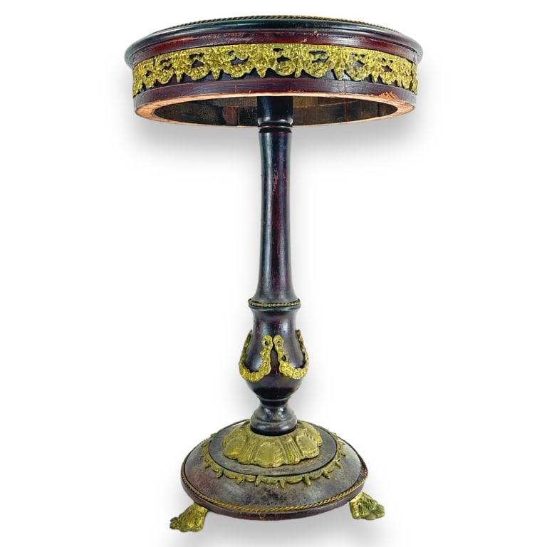Antique wooden gilt metal clad French Empire style round side end table. Completed with black marble (1 of 3)