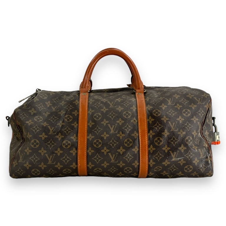 Vintage Louis Vuitton classic brown leather jacquard monogram duffle / deuffel bag. Measures approx. (1 of 3)