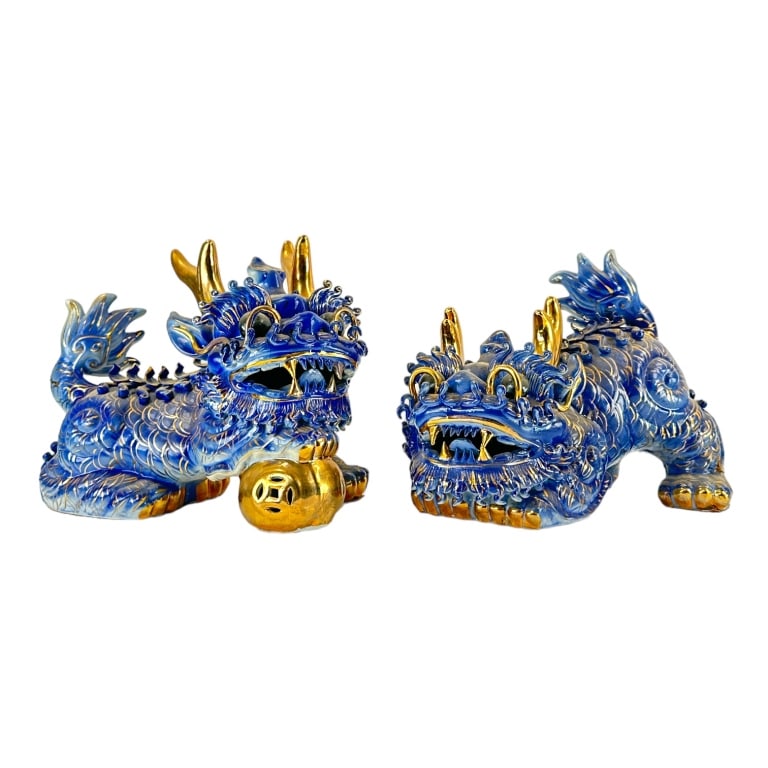 A pair of vintage Chinese cobalt blue glazed porcelain foo lion temple sculptures completed with (1 of 4)