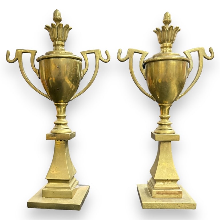 A pair of vintage urn sculptures crafted of heavy gilt brass. No apparent hallmarks. Each measures (1 of 3)