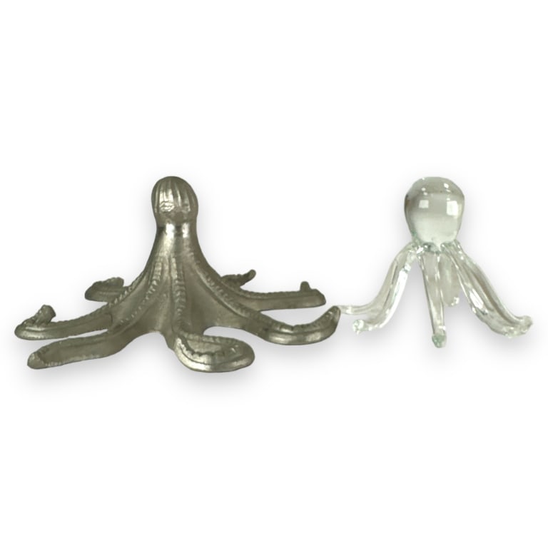 A lot of 2 figural octopus items. One crafted of white metal and the other of hand blown glass. No (1 of 3)