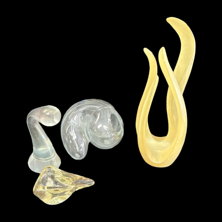 A four piece lot of art glass and acrylic abstract modernist items. Lot includes a clear glass vase (1 of 4)