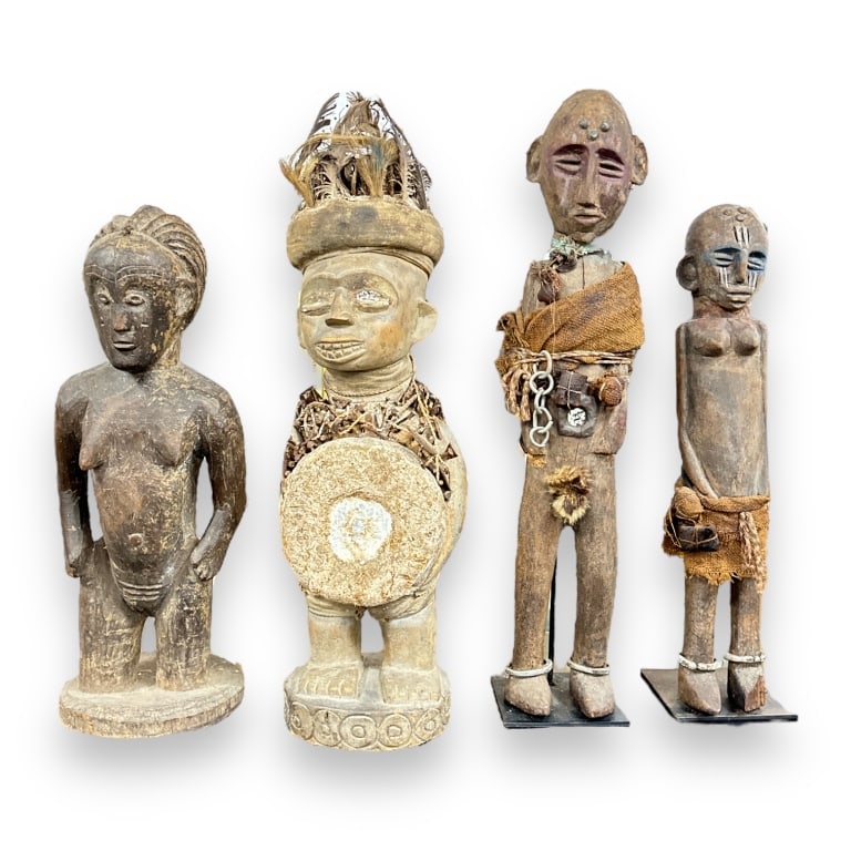 A lot of 4 vintage African carved wooden sculptures depicting standing figures. Tallest measures (1 of 5)