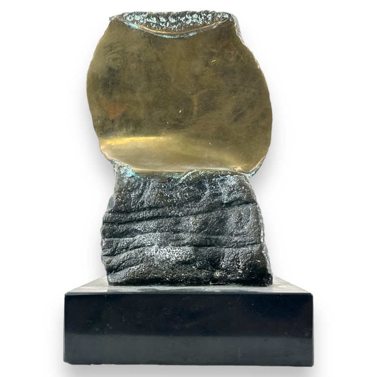 A modernist parcel gilt and brown patina bronze sculpture on black onyx base. No apparent signature. (1 of 3)