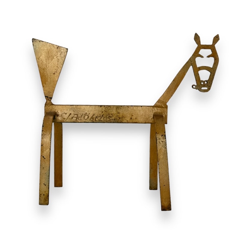 A signed openwork gold tone metal, probably iron, sculpture depicting a standing horse. Signed (1 of 3)