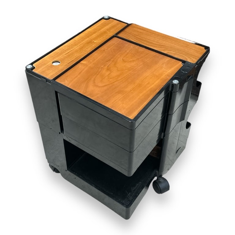 A vintage designer signed Joe Colombo rolling side table crafted of black acrylic with wooden tops. (1 of 4)