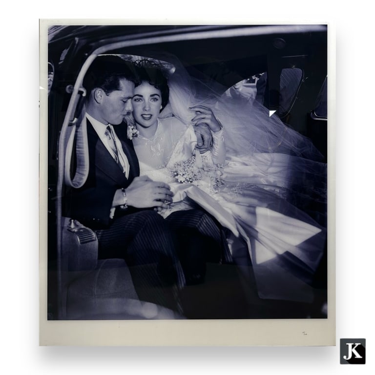 Frank Worth (AMERICAN, 1923 - 2000) platinum print on paper depicting a photograph of Elizabeth: Frank Worth (AMERICAN, 1923 - 2000) platinum print on paper depicting a photograph of Elizabeth Taylor and Conrad Hilton Jr. wedding. Hand marker numbered 15/24 to lower right. Mounted in acrylic fron