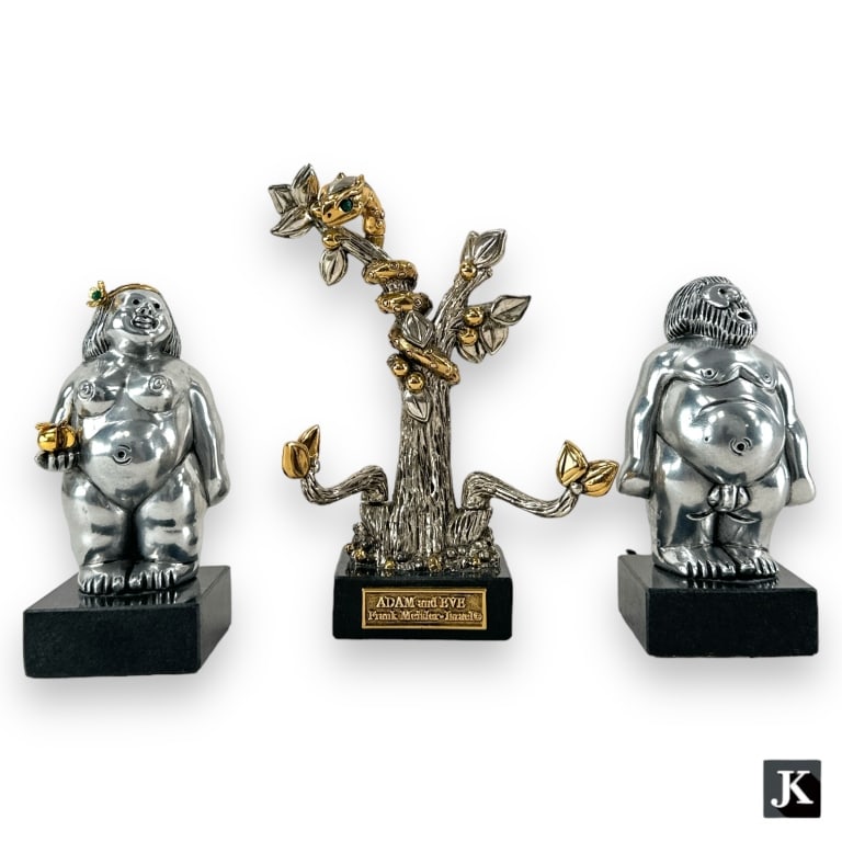 Set depicting Eve holding an apple with Adam and the tree of knowledge with serpent set with: Set depicting Eve holding an apple with Adam and the tree of knowledge with serpent set with malachite stone eyes. Signed and numbered 206/1600. Tallest piece measures approx. 6 1/4" height (15.8cm).