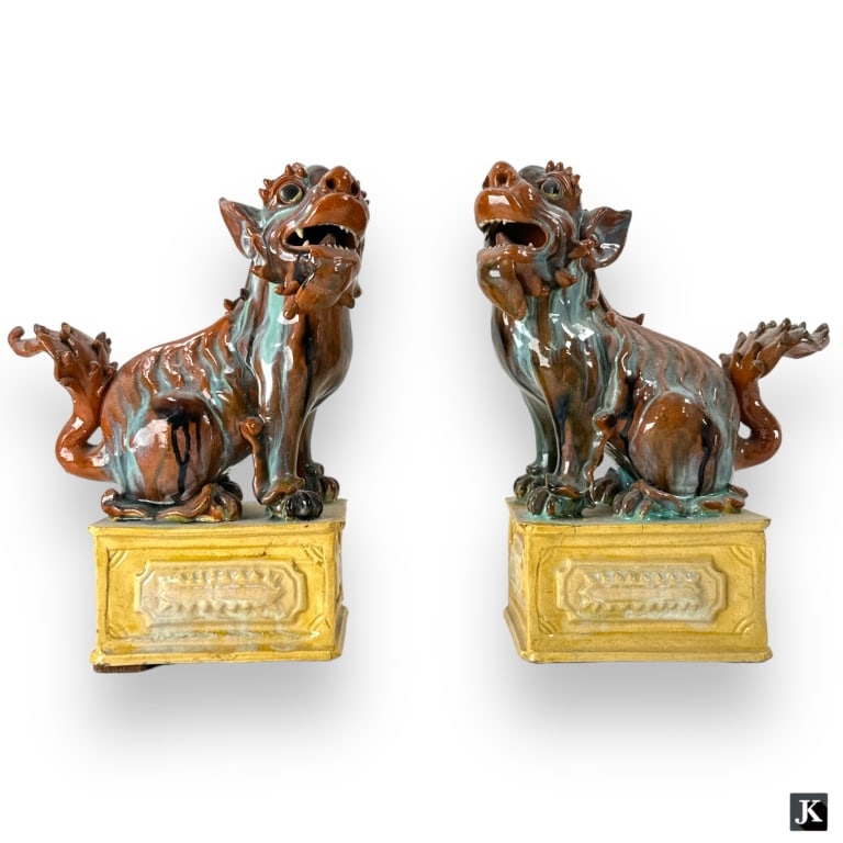 A pair of Chinese glazed pottery foo lion sculptures. No apparent hallmarks. Each measures approx. 9 (1 of 3)