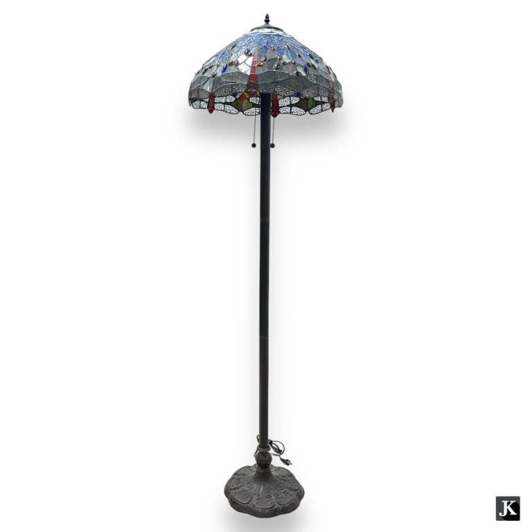 A Tiffany Studios style bronze floor lamp with dragonfly motif slag glass shade. Measures approx. (1 of 3)