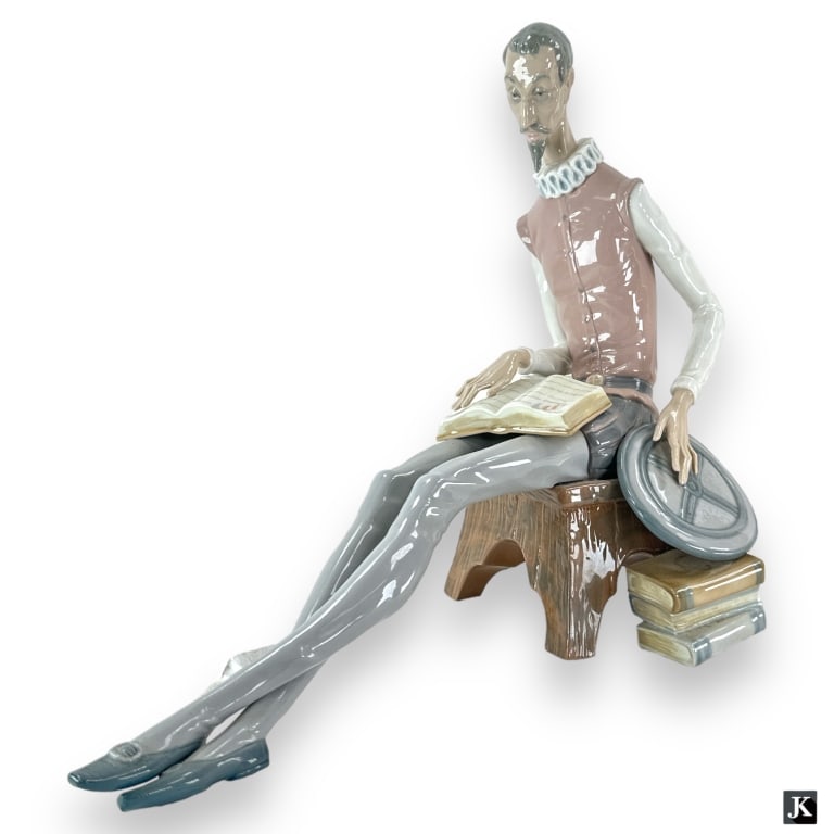 Large Nao Daisa Spanish glazed porcelain sculpture depicting a seated Don Quixote on stool with (1 of 5)