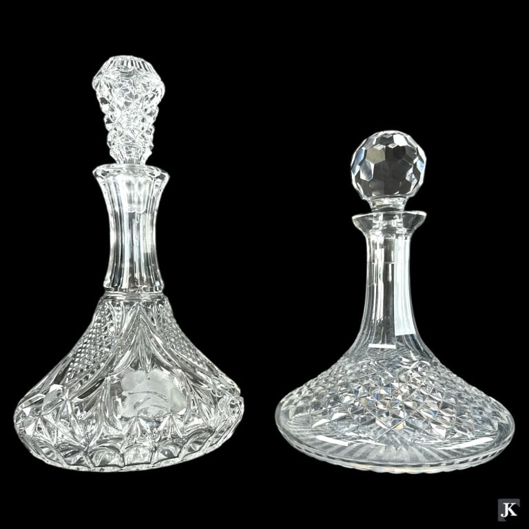 A lot of 2 vintage cut glass ships decanters with stoppers. No apparent hallmarks. Tallest measures (1 of 3)