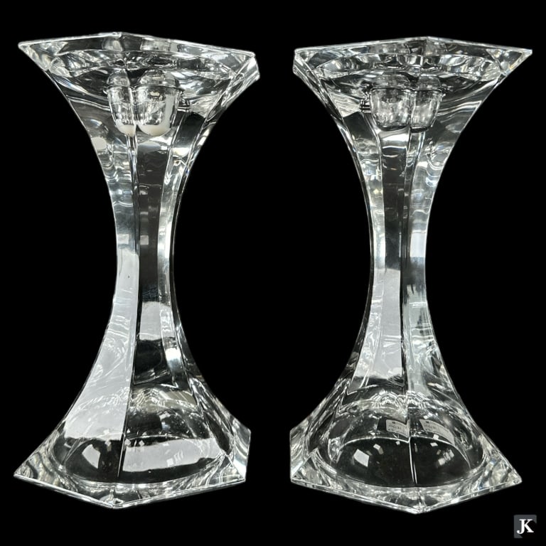 A pair of well constructed Baccarat style heavy clear crystal candlestick holders having a tapered (1 of 2)