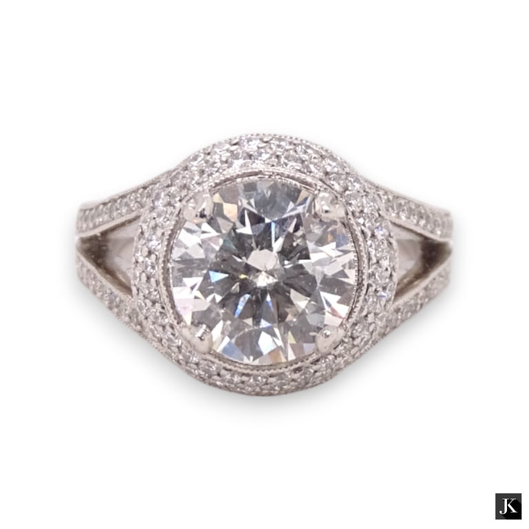 Designer Michael Beaudry impressive women's Halo diamond 900 platinum ring. Includes presentation: Designer Michael Beaudry impressive women's Halo diamond 900 platinum ring. Includes presentation box. Features a center round cut genuine diamond approx. 2 to 2.5ct, SI-2 clarity, G-H color. Total we