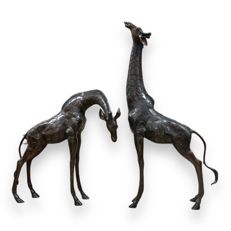 A pair of large bronze giraffe animal sculptures. One depicted with neck up and the other with its (1 of 4)