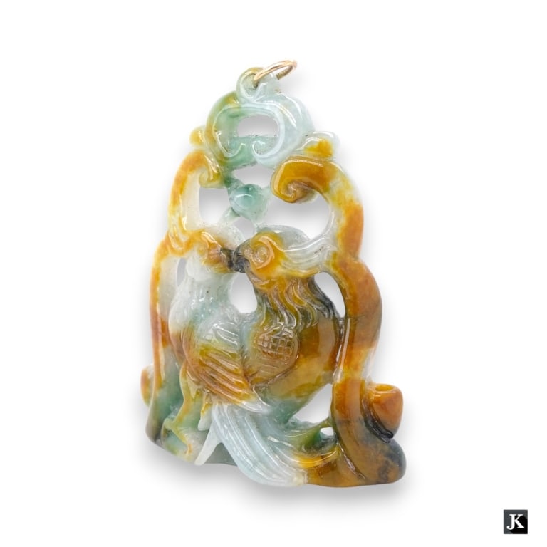 Chinese Tri-Tone Jadeite Jade Birds Pendant: Chinese fully reticulated jadeite jade pendant depicting kissing birds amongst scrolled vines. Has suffusions of white, spinach green and russet tones. Completed with a yellow gold tone bale. Measures