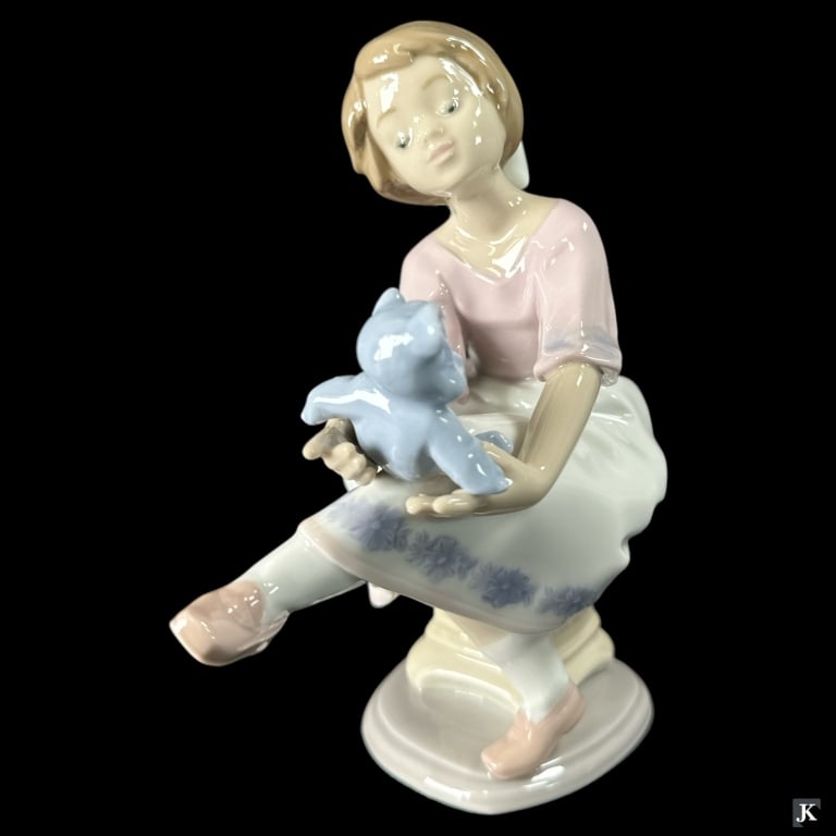 Lladro Spain "Best Friends" Porcelain Figure #7620: Lladro Spanish glazed porcelain sculpture titled "Best Friends" or "Columpiando al Osito" number 7620. Sculpted by Francisco Polope. Issued in 1993 and retired in 1993. Measures approx. 6 1/4" height.