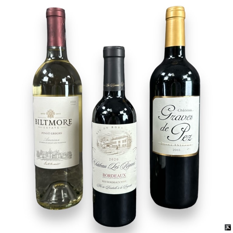 Colection Of 3 Sealed Wine Bottles Red & White: A collection of three sealed wine bottles. Lot includes a 2015 Chateau Graves de Pez Saint-Estephe 750ML, 2020 Vin De Bordeaux Chatueau Des Riganes Red Bordeaux Wine 375ML and a 2022 Biltmore Estate P