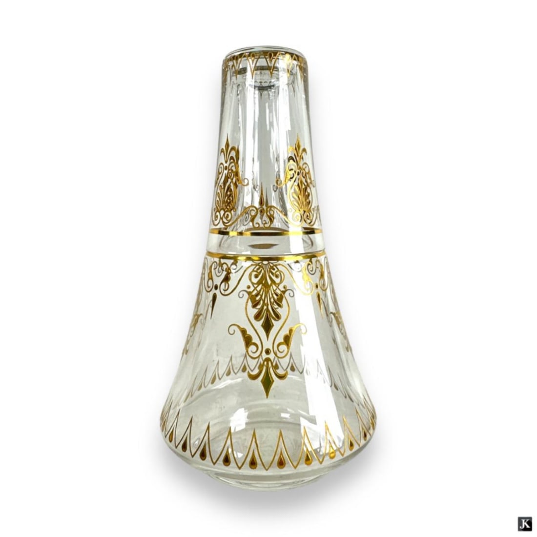 Baccarat France LE Decanter And Tip Up Glass: Baccarat French crystal decanter or carage with verre tip up glass. Completed with hand painted gilt scrolled design. Decanter and glass with round hallmark. Limited edition 28/200. Measures approx. 8