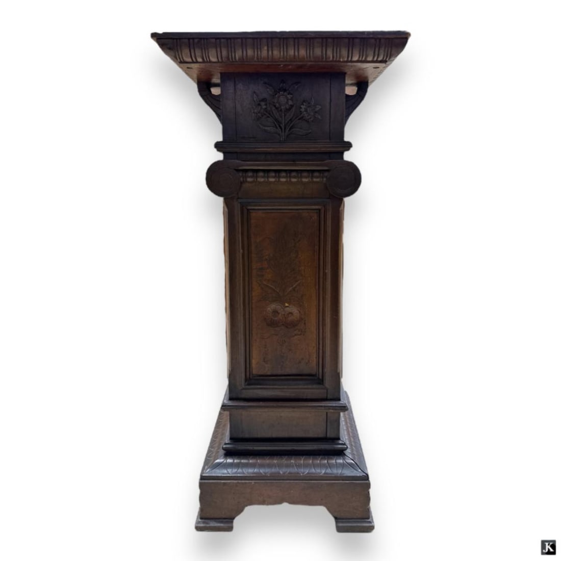 Vintage Carved Wood Pedestal: Vintage Carved Wood Pedestal. Decorated in a floral motif. 1 panel to base missing, Wear consistent with age and use. Measures 36-1/2" H x 16" x 16".JD/B17