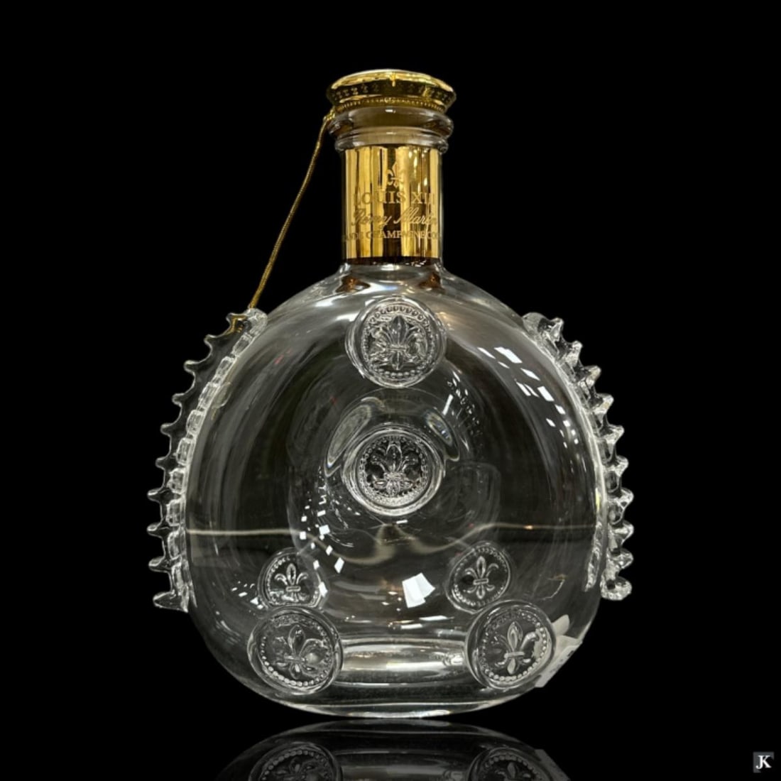 Baccarat Remy Martin XIII Crystal Decanter: A hand-blown Baccarat Remy Martin Louis XIII crystal decanter bottle. This piece is an exact replica of a rare decanter used during the period of Louis XIII, produced exclusively for E. Remy Martin Ci