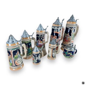 Eight (8) German Lidded Steins