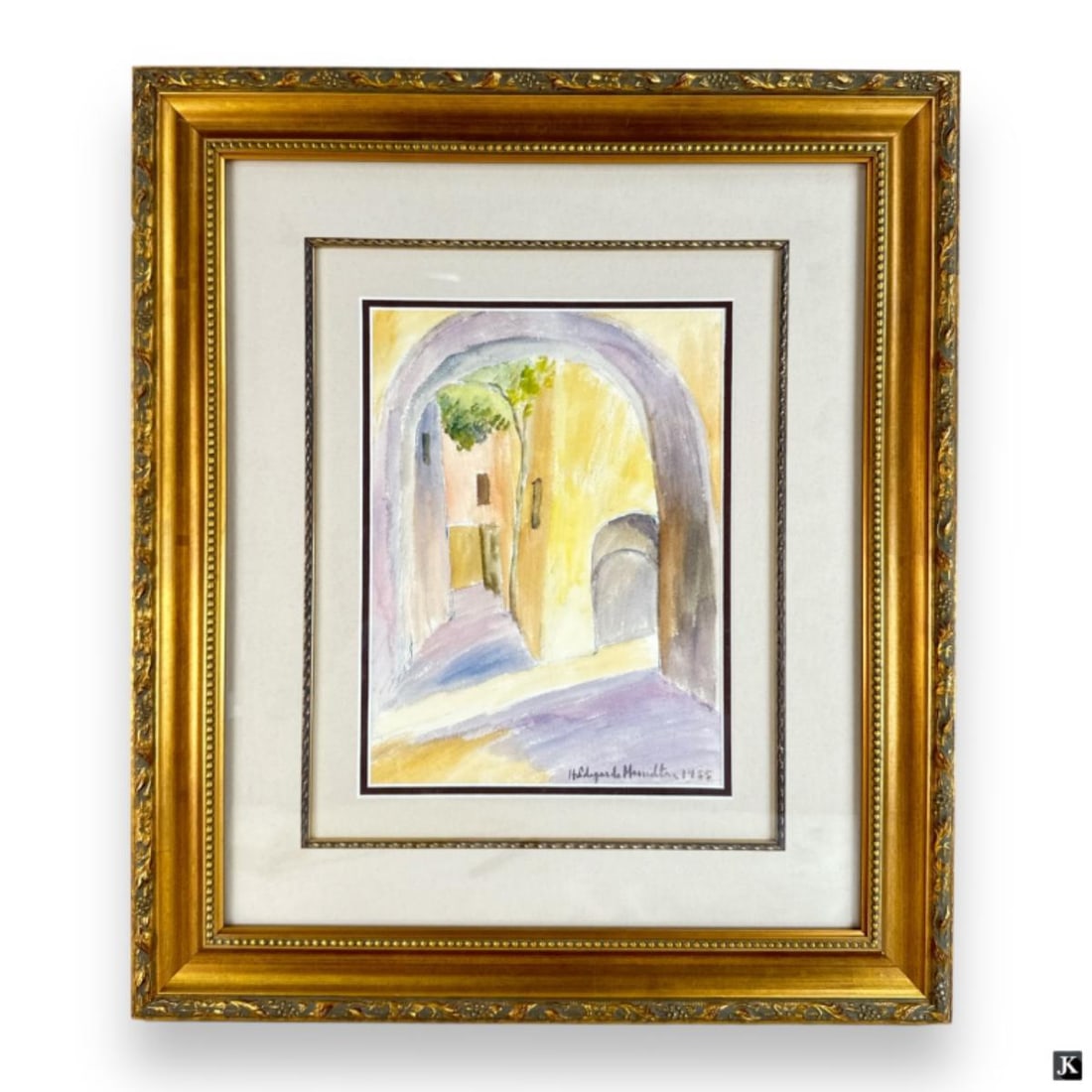 Hildegarde Hamilton (USA 1898-1970) 1955 Watercolo: Hildegarde Hume Hamilton (AMERICAN / FLORIDA / VIRGINIA, 1898 - 1970) watercolor work on paper depicting a townscape scene with alley and archway. Signed to lower right and dated 1955. Mounted in a go