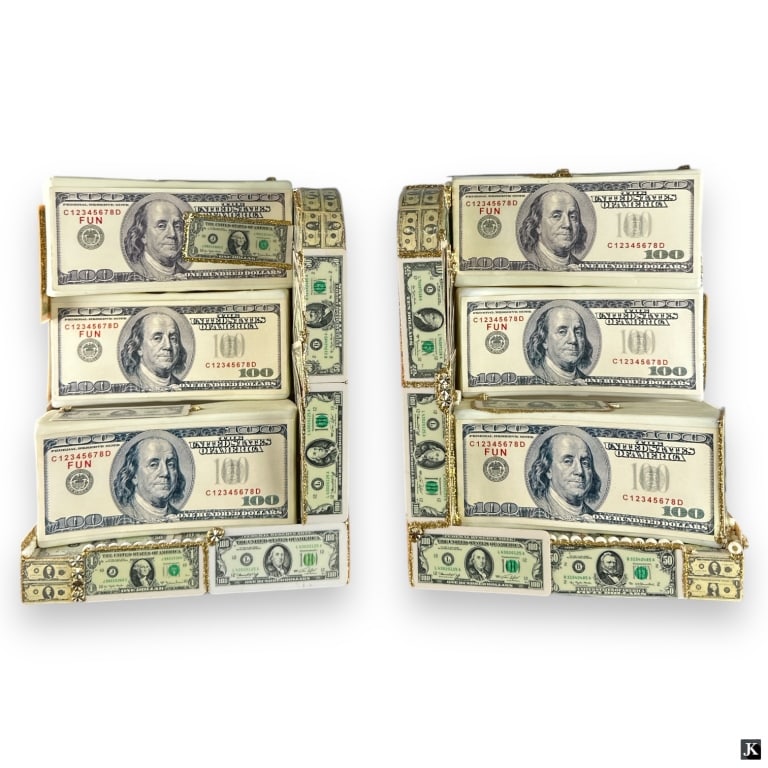 Pair "Cash" Bookends: Pair "Cash" Plastic Bookends. Unsigned. Good condition. Each measures 9" H x 7" L x 5-1/2" W. JD/32S***All items must be removed from the auction house within seven business days following the auction