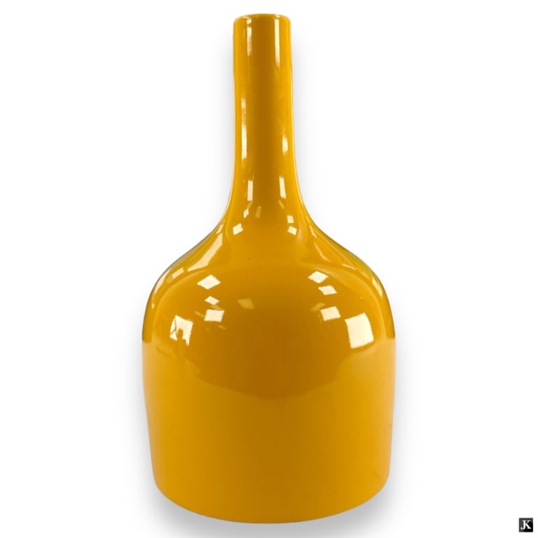 Chinese Egg Yolk Glaze Porcelain Bottle Form Vase: A Chinese Qing egg yolk yellow glazed porcelain vase having a bottle or bell form. Bottom has impressed six character zhuanshu Yongzheng reign mark. Measures approx. 9" height x 5 1/4" diameter. Appea