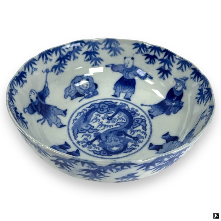Vintage Chinese Blue & White Porcelain Bowl: Vintage Chinese Blue & White Porcelain Bowl. Features a figural motif of children in various poses and a center medallion with dragon. Lightly scalloped rim. Double rings on foot. Blue under glaze cha