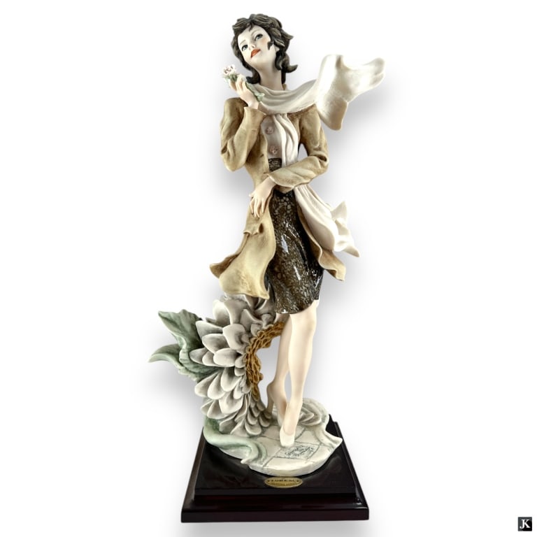 Giuseppe Armani – DAHLIA – 0745E: Sculpture by Giuseppe Armani, titled “DAHLIA”, Reference # 0745E. Figurine is in perfect condition, "E" Finish, attached to wooden base. Impress artist signature. Marked made in Italy. Flo
