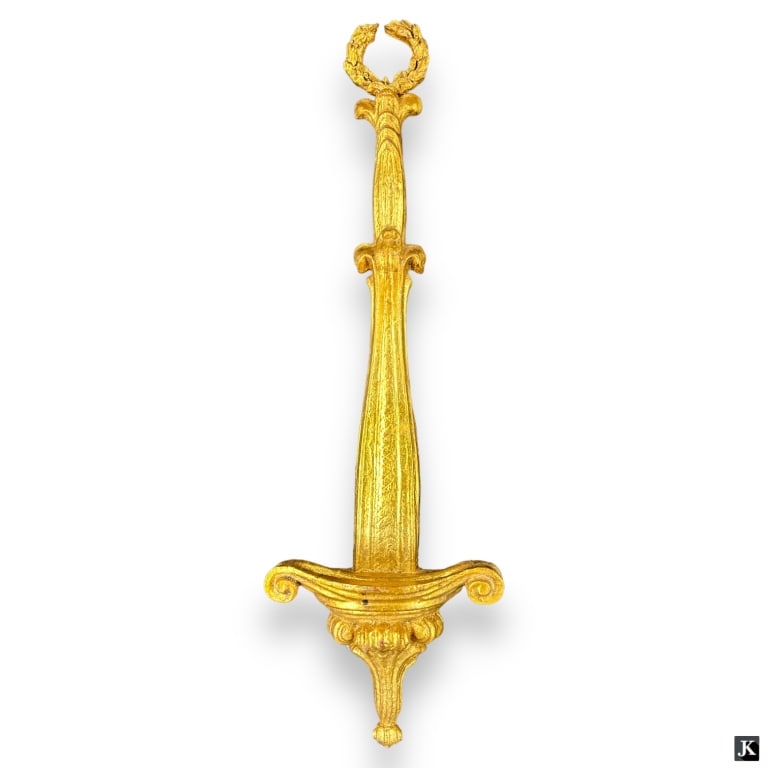 Vtg French Empire Style Gilt Wood Wall Decoration: A vintage French Empire style gilt wood carved wall decoration having a scroll and wreath design. Has a groove that appears to be designed to hold a decorative plate. No apparent hallmarks. Measures a