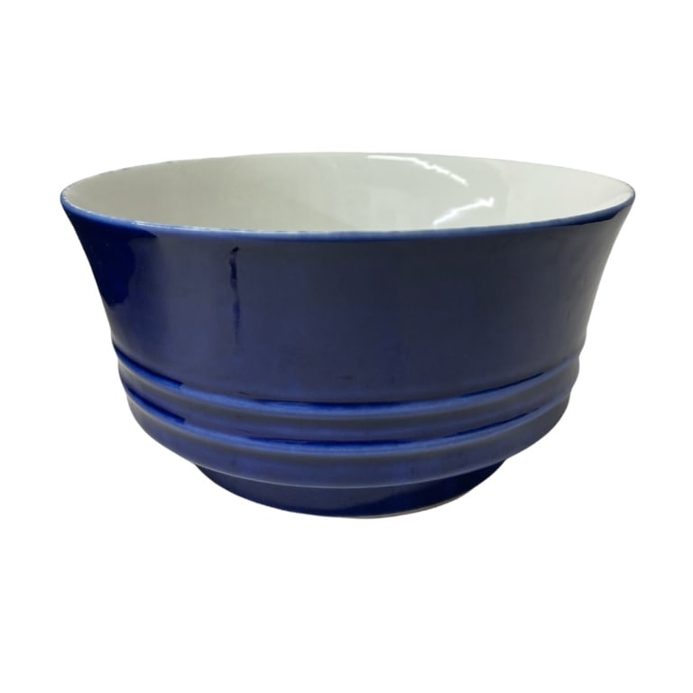 Chinese Qing Dynasty Blue & White Porcelain Bowl: Antique Chinese Qing Dynasty period, circa 19th century, porcelain bowl with cobalt blue exterior and white interior glazed finish. Accented with two ribbed lines and centered foot. Bottom holds blue 
