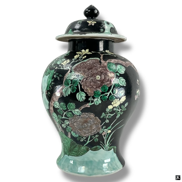 Chinese Qianglong Famille Noir Porcelain Jar: Chinese Qianglong Famille Noir Porcelain Ginger Jar with Lid. Features a floral and bird motif. Stamped with Qianglong mark on base. Chip on rim of top or in good period condition consistent with age.