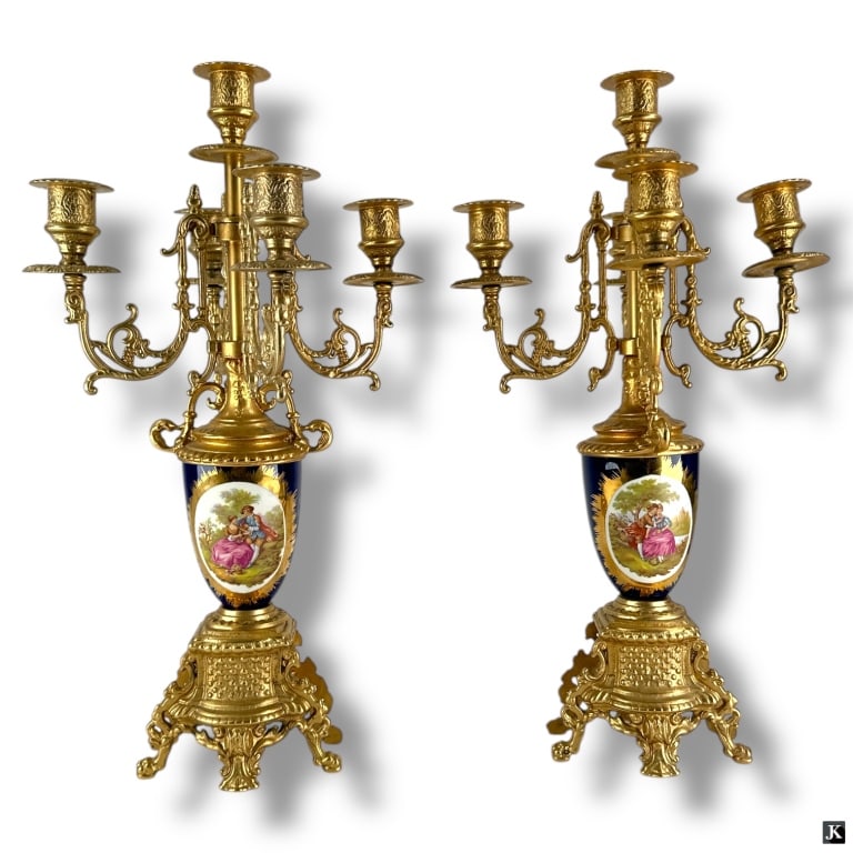 Pair Vintage Gilded Spelter, Porcelain Candelabras: Pair Vintage Gilded Spelter, Porcelain Candelabras. Each with 5 lights. Unsigned. 1 with repair to porcelain or in good vintage condition. Measures 16-1/2" H x 9" W. LA/B13/SH:2C