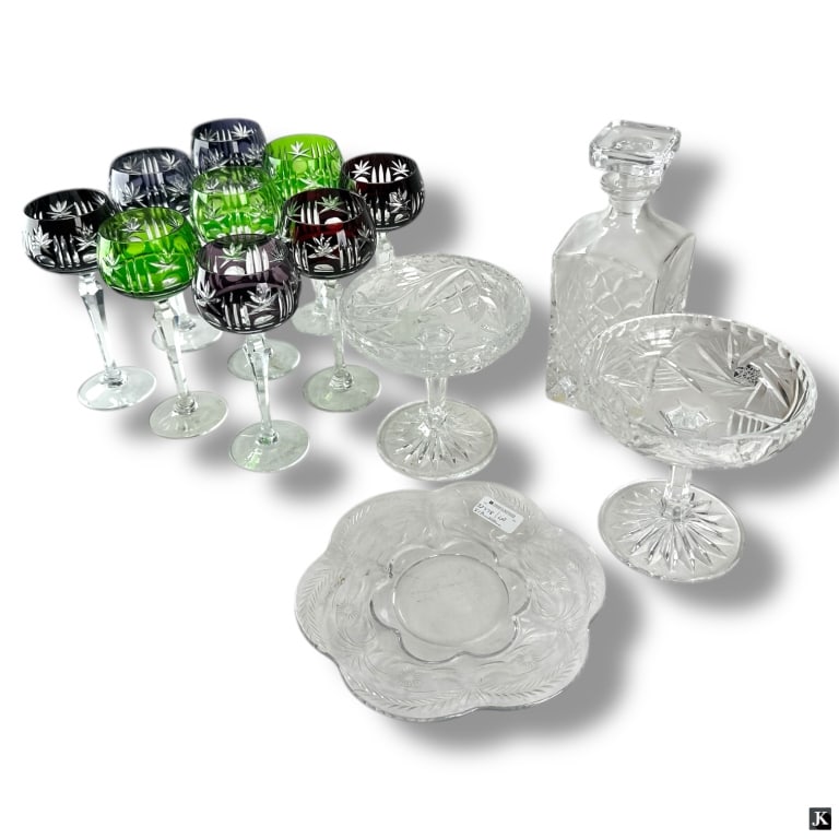 13 Pieces Vintage Crystal & Glass Serveware: 13 Pieces Vintage Crystal & Glass Serveware. Lot includes 9 colored cut crystal wine hocks 7-1/2" unsigned' 2 glass compotes 5-3/4" H x 6" W; glass decanter 9-3/4" H 1 etched plate 8-3/4". Unsigned. G