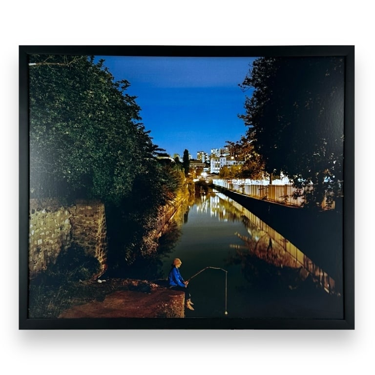 Kevin Cooley (USA B1975) Chromogenic Print Of Cana: Kevin Cooley (AMERICAN / LOS ANGELES, Born 1975) chromogenic print depicting a canal with fisherman. Probably signed and numbered to verso. Mounted in a black lacquer wooden frame. Paper measures appr