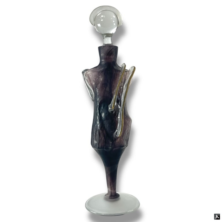 Elena of Germany Art Glass Figural Decanter: Elena of Germany Art Glass Figural Decanter. Unsigned. Good condition. Measures 16" H. LA/B13/SH:10A