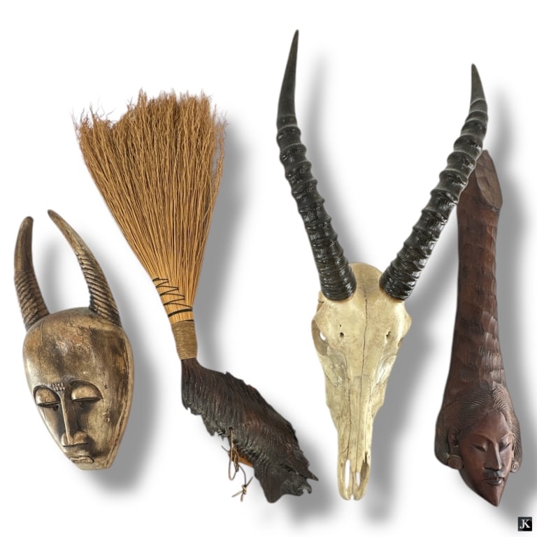 4 Ethnographic Decorative Objects: 4 Ethnographic Decorative Objects. Lot includes: a signed carved wood Balinese mask 23" H, ceramic composition African style mask 16-1/2", Blesbok skull and horns 24", a handmade driftwood broom 27".